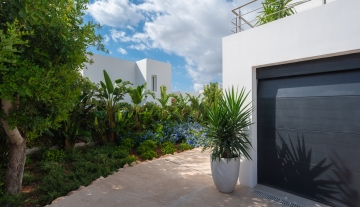 Resa estates Ibiza villa for sale tourist license modern side garden .jpg